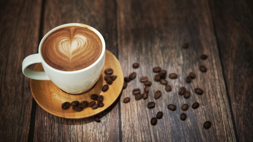 coffee-cup-foam-drink-coffee-beans-wood-desktop.jpg